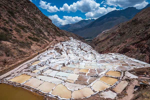  Salineras or Maras shows salt pools in the high andes of Sacred Valley 