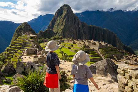  Childs in the citadel of Machu Picchu In Peru